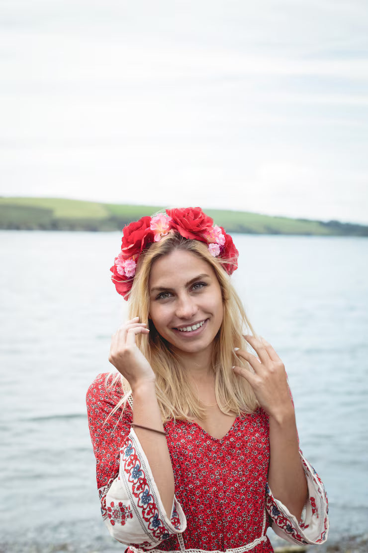 files/mulher-loira-vestindo-uma-tiara-de-flor-em-pe-perto-de-um-rio_107420-65634.avif